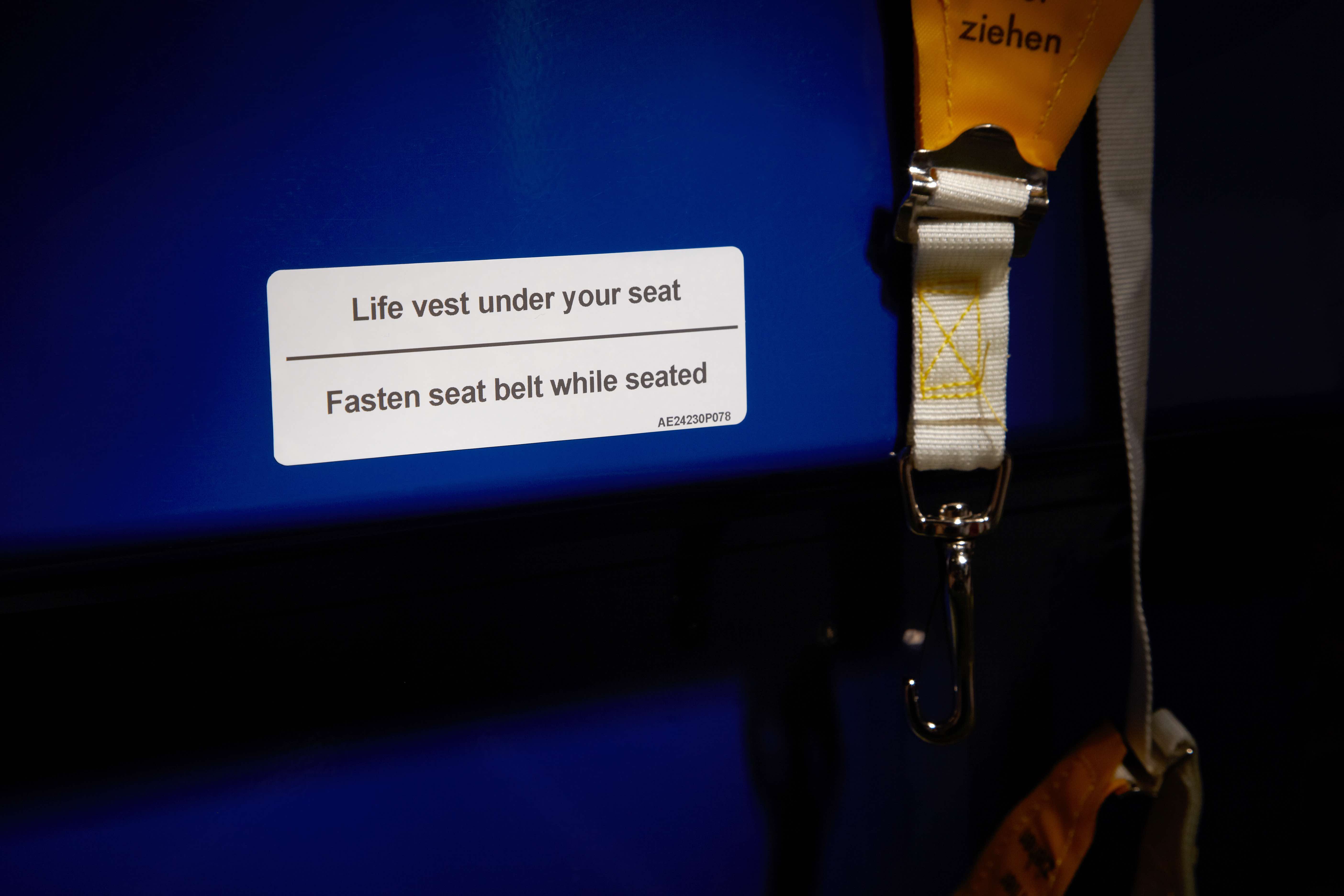 Airline Placard "Life Vest Under Your Seat"